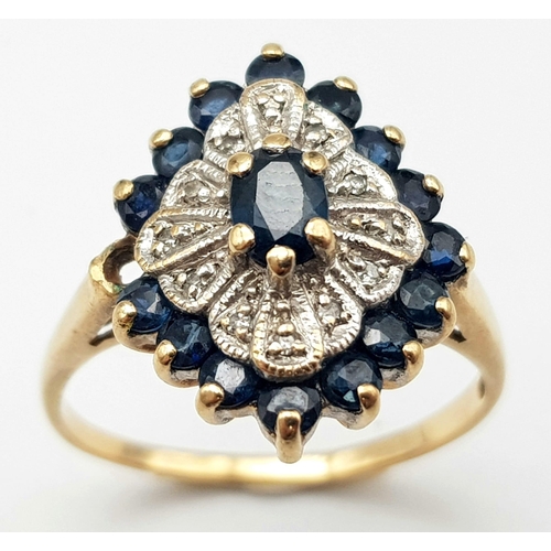 404 - A 9K Yellow Gold Diamond and Sapphire Cluster Ring. Size O. 3.3g total weight.