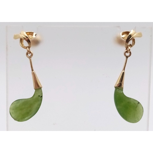 467 - A Pair of 14K Yellow Gold and Jade Earrings. 2.4g total weight.