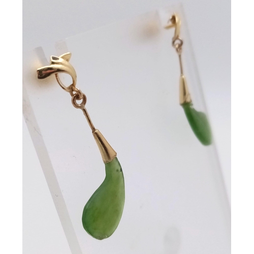 467 - A Pair of 14K Yellow Gold and Jade Earrings. 2.4g total weight.