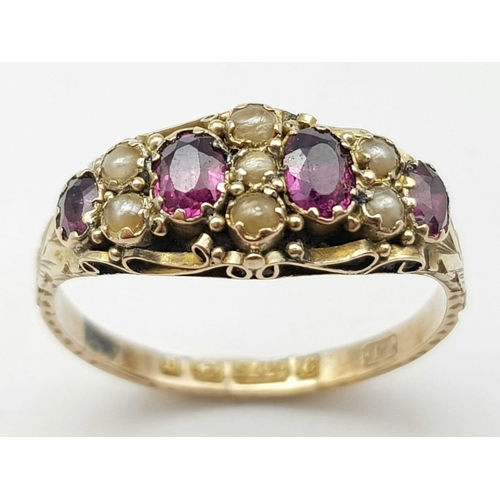 544 - A 9 k yellow gold ring with oval cut amethysts and seed pearls. Size: p, weight; 1.9 g.