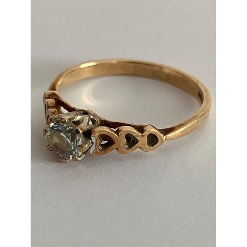 595 - 9 carat YELLOW GOLD SOLITAIRE RING. Having 0.25 carat sparkling Zirconia set to top. Attractive Hear... 