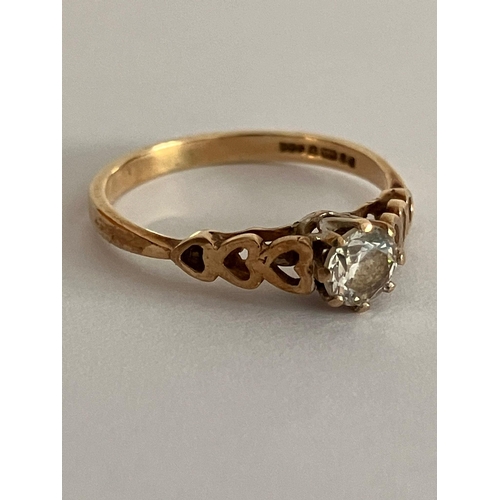 595 - 9 carat YELLOW GOLD SOLITAIRE RING. Having 0.25 carat sparkling Zirconia set to top. Attractive Hear... 