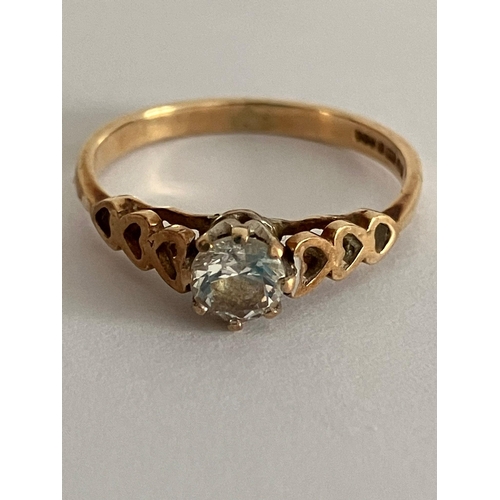 595 - 9 carat YELLOW GOLD SOLITAIRE RING. Having 0.25 carat sparkling Zirconia set to top. Attractive Hear... 