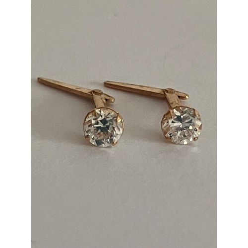 651 - 2 x Pairs 9 carat GOLD STUD EARRINGS. To include Zirconia, and Garnet complete with gold backs. 0.72... 