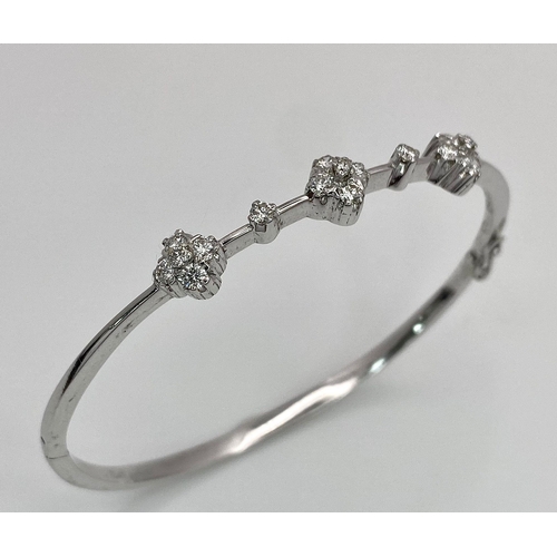 68 - A VERY PRETTY AND ATTRACTIVE 18K WHITE GOLD DIAMOND SET BANGLE, APPROX 0.30CT, WEIGHT 8.5G AND 53MM ... 