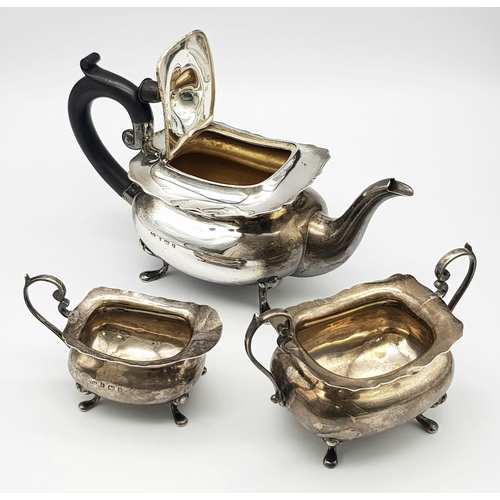 80 - A SILVER TEA SET COMPRISING OF TEA POT , SUGER BOWL AND CREAMER HALLMARKED BIRMINGHAM 1900 , CLASSIC... 