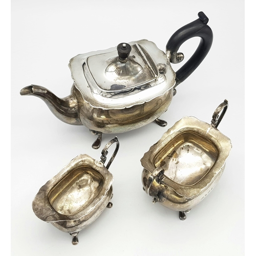 80 - A SILVER TEA SET COMPRISING OF TEA POT , SUGER BOWL AND CREAMER HALLMARKED BIRMINGHAM 1900 , CLASSIC... 