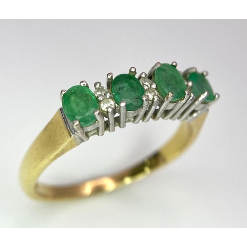 157 - An 18 K yellow gold ring with a band of alternating diamonds and emeralds, size: R, weight: 3.9 g.