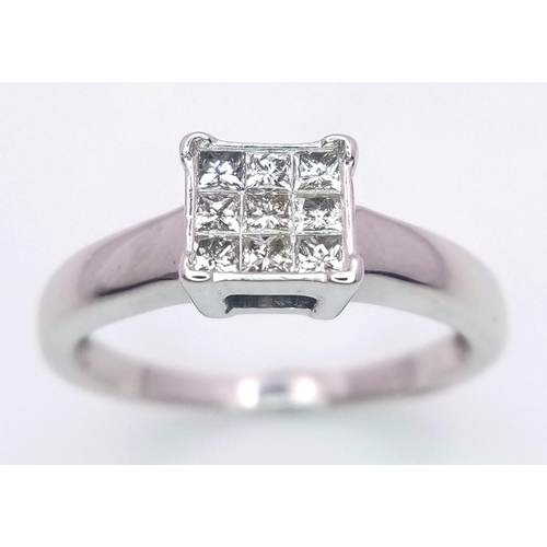 215 - An 18K White Gold (tested) Diamond Ring. 0.30ct. Size M. 3g total weight.