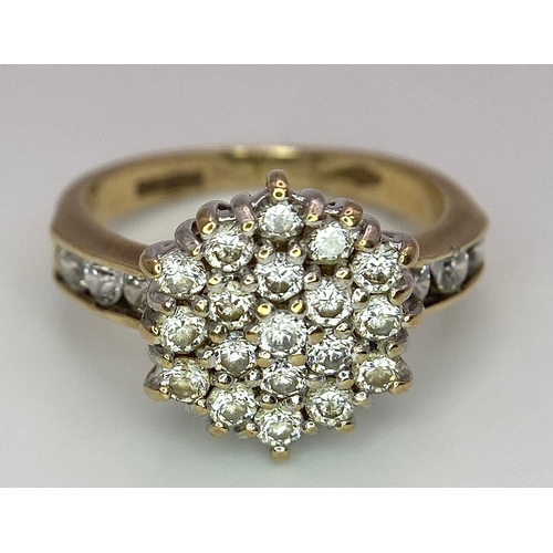 243 - A 9K Yellow Gold CZ Flower Cluster Ring. Size I. 3.1g total weight.