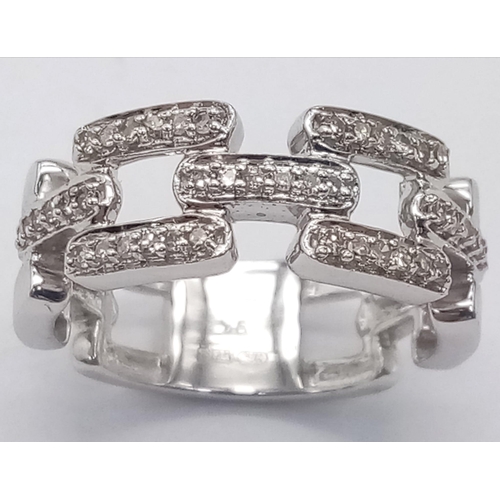 292 - AN UNIQUE DESIGNED 9K WHITE GOLD DIAMOND SET FANCY RING, WEIGHT 4.7G SIZE N