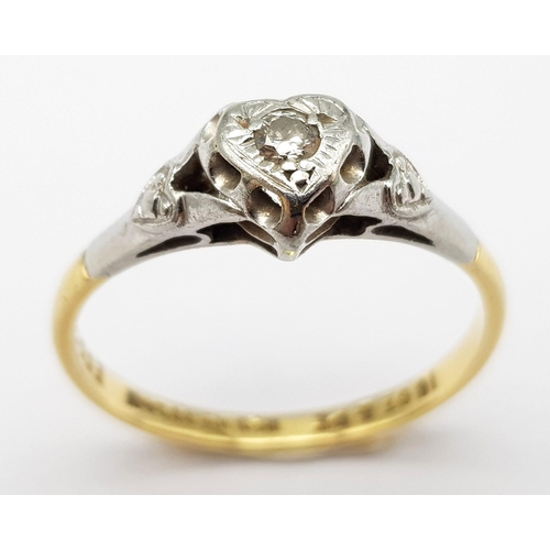 306 - A Vintage 18K Yellow Gold and Platinum Diamond Ring. Round cut diamond in a heart setting. Size O. 2... 