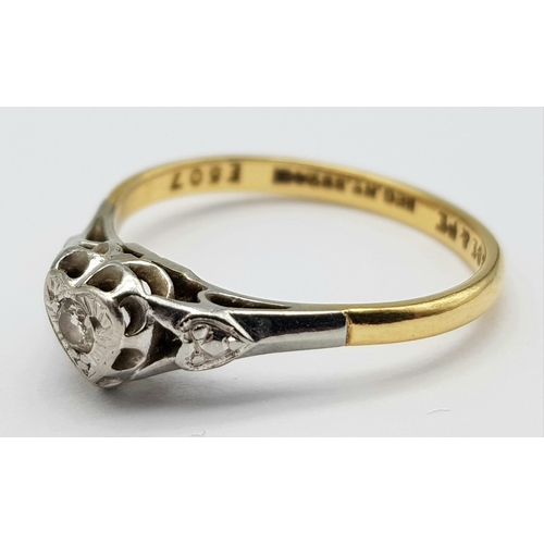 306 - A Vintage 18K Yellow Gold and Platinum Diamond Ring. Round cut diamond in a heart setting. Size O. 2... 