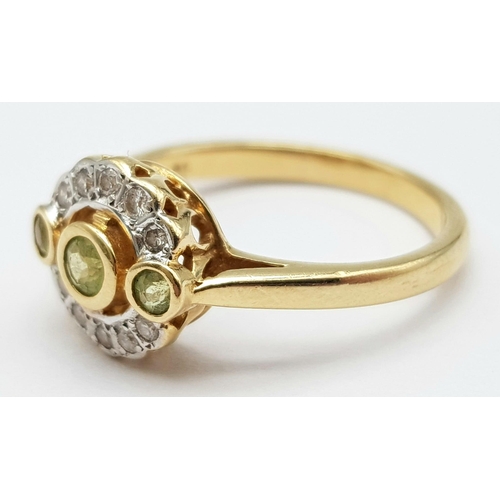 316 - AN ATTRACTIVE VINATGE 14K YELLOW GOLD DIAMOND & PERIDOT RING, WEIGHT 3.3G SIZE M