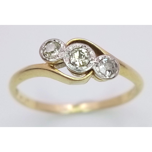 337 - A VINTAGE 18K YELLOW GOLD & PLATINUM  TWIST RING SET WITH 3 OLD CUT  DIAMOND STONES, WEIGHT 2.2G SIZ... 