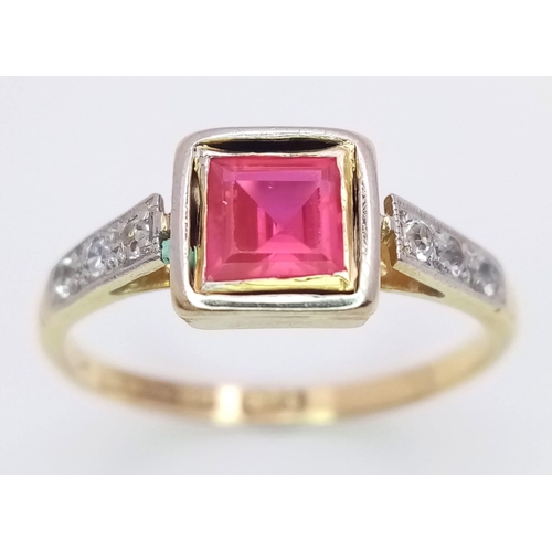 351 - A vintage 18 K yellow gold and platinum ring with a ruby on top and diamonds on the shoulders of the... 