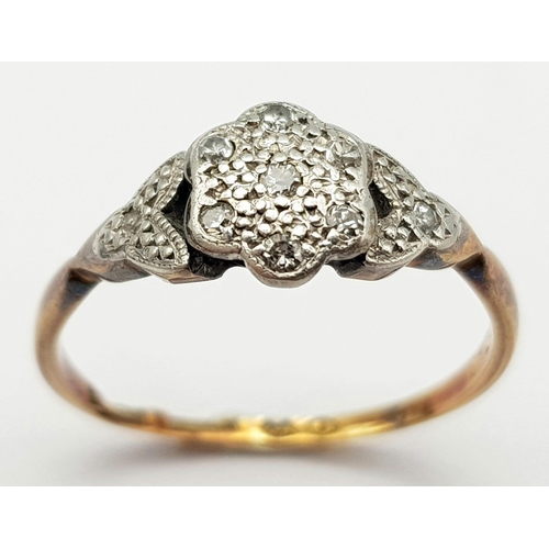 397 - A Vintage 18K Yellow Gold and Platinum Diamond Cluster Floral Ring. Size K. 1.9g total weight.