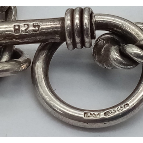 547 - A sterling silver bracelet, with rope shaped links and T bar clasp, weight: 32.1 g.