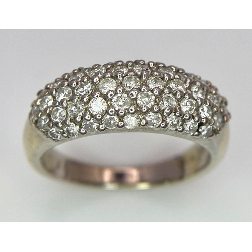 83 - An 18 K white gold ring with five round cut diamond bands (0.80 carats). Size: J, weight: 4.4 g.