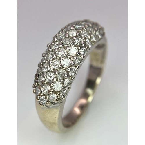 83 - An 18 K white gold ring with five round cut diamond bands (0.80 carats). Size: J, weight: 4.4 g.