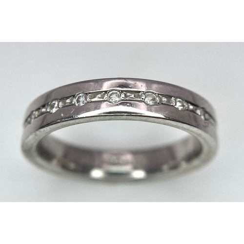 97 - An 18 K white gold, diamond set band ring, size: M, weight: 6.3 g