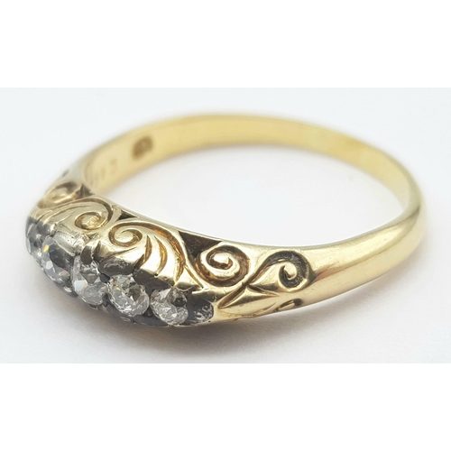 131 - An 18K Yellow Gold Diamond Gypsy Ring. 0.15ctw diamonds. Size P. 4.9g total weight.