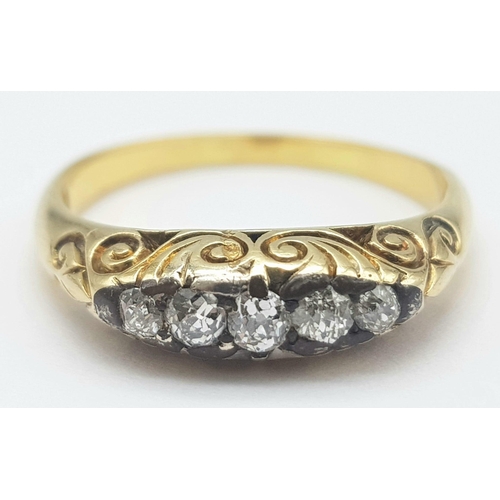 131 - An 18K Yellow Gold Diamond Gypsy Ring. 0.15ctw diamonds. Size P. 4.9g total weight.