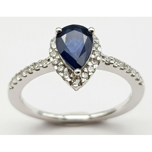 173 - An 18K White Gold, Diamond and Sapphire Pear-Shaped Cluster Ring. 0.65ct sapphire. Size M 1/2. 3.1g ... 