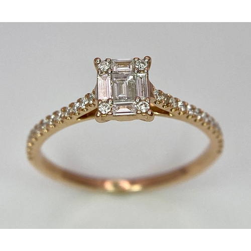 178 - An 18 K rose gold ring with a square emerald cut diamond and more round cut diamonds on the shoulder... 