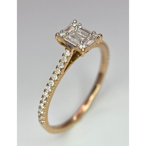 178 - An 18 K rose gold ring with a square emerald cut diamond and more round cut diamonds on the shoulder... 