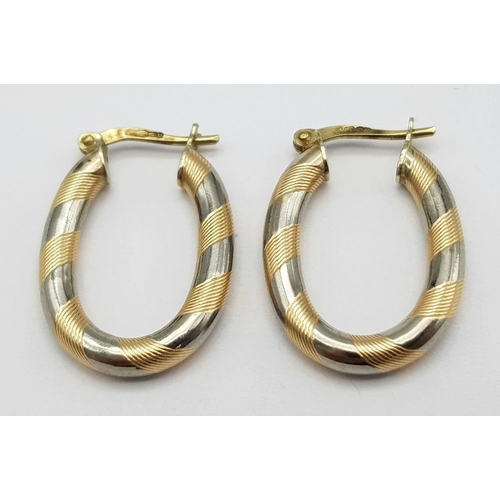 376 - A PRETTY PAIR OF 9K 2 COLOUR  GOLD OVAL HOOP EARRINGS, WEIGHT 2.1G