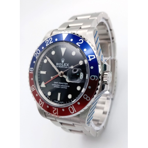 51 - A Rolex GMT-Master 16700 Model Automatic Gents Watch. Stainless steel bracelet and case - 40mm. 'Pep... 