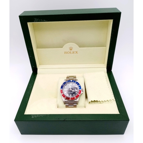 51 - A Rolex GMT-Master 16700 Model Automatic Gents Watch. Stainless steel bracelet and case - 40mm. 'Pep... 