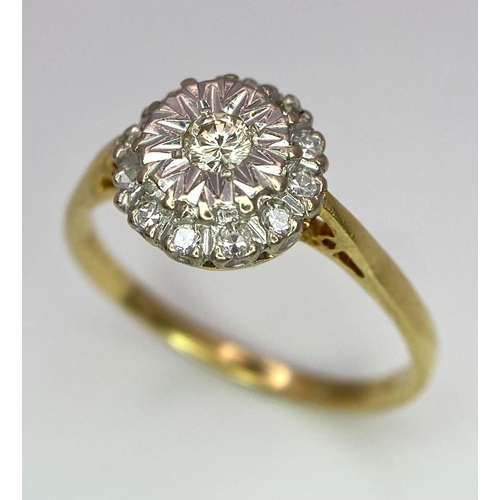 274 - An 18 K yellow gold ring with a diamond cluster, size: P, weight: 3 g.