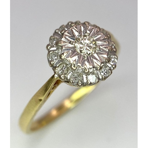 274 - An 18 K yellow gold ring with a diamond cluster, size: P, weight: 3 g.