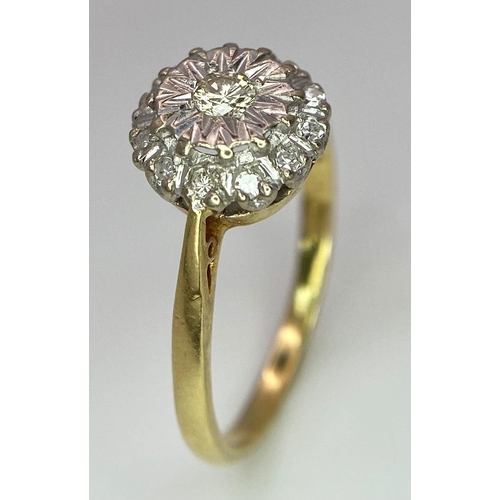 274 - An 18 K yellow gold ring with a diamond cluster, size: P, weight: 3 g.