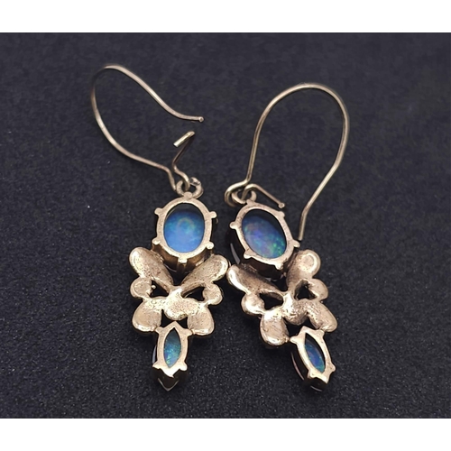 533 - A vintage, 9 K yellow gold pair of drop earrings with opals and seed pearls. height: 24 mm, weight: ... 