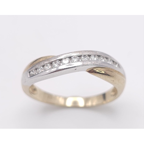 446 - A 9K Yellow Gold and Diamond Half-Eternity Ring. 0.22ctw. 2.3g total weight. Size P.