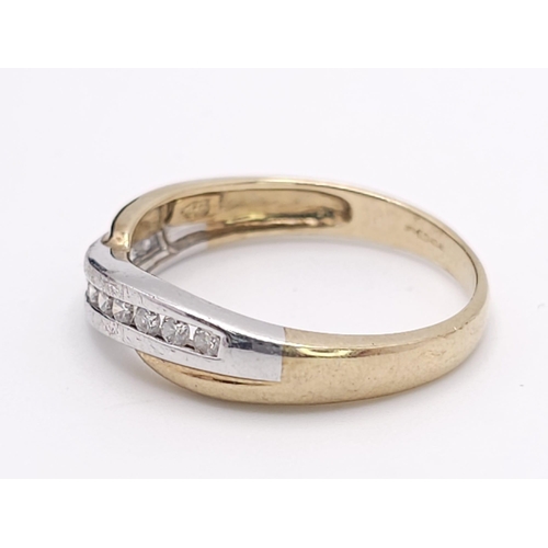 446 - A 9K Yellow Gold and Diamond Half-Eternity Ring. 0.22ctw. 2.3g total weight. Size P.