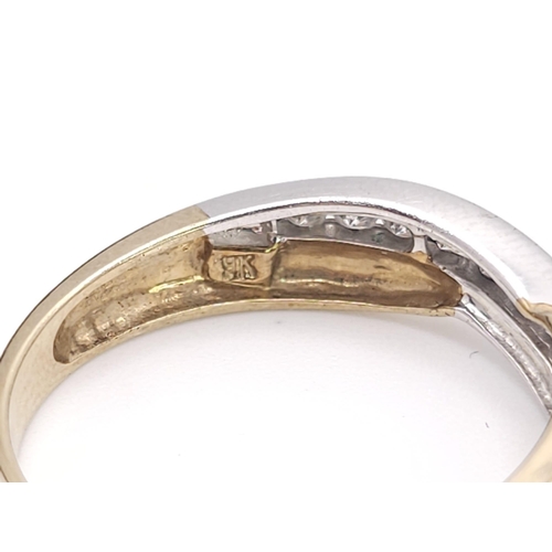 446 - A 9K Yellow Gold and Diamond Half-Eternity Ring. 0.22ctw. 2.3g total weight. Size P.