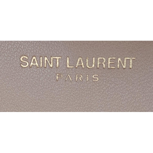 102 - A Saint Laurent envelope shoulder bag, soft beige calfskin with gold hardware and strap, press stud ... 