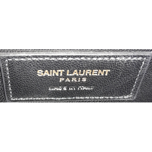 102 - A Saint Laurent envelope shoulder bag, soft beige calfskin with gold hardware and strap, press stud ... 