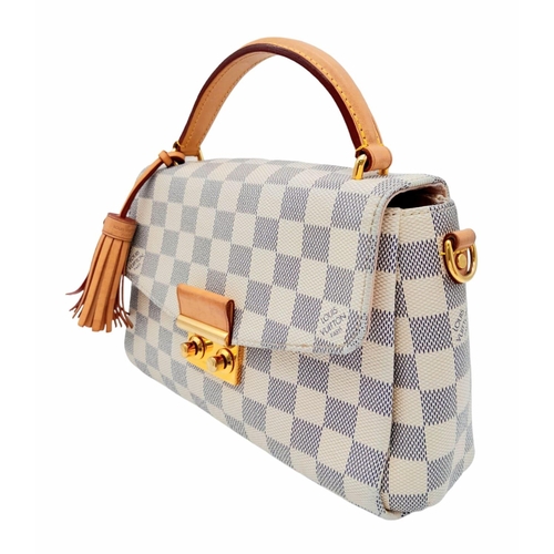 123 - A Louis Vuitton damier canvas Croisette handbag in cream/blue, interior is baby pink. Leather handle... 