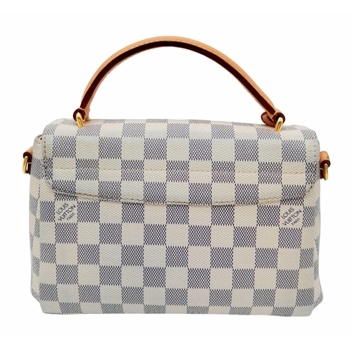 123 - A Louis Vuitton damier canvas Croisette handbag in cream/blue, interior is baby pink. Leather handle... 