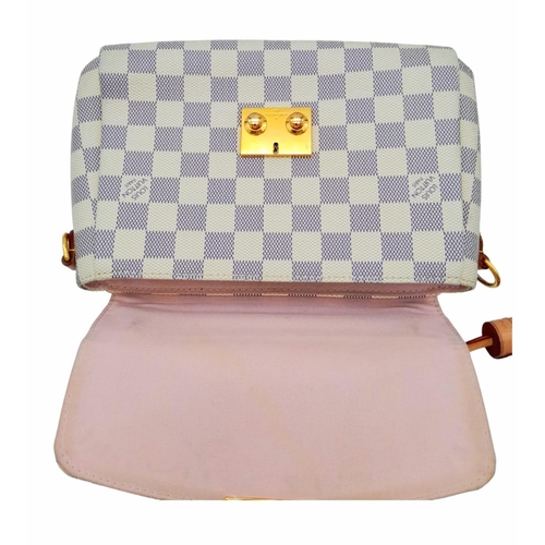 123 - A Louis Vuitton damier canvas Croisette handbag in cream/blue, interior is baby pink. Leather handle... 