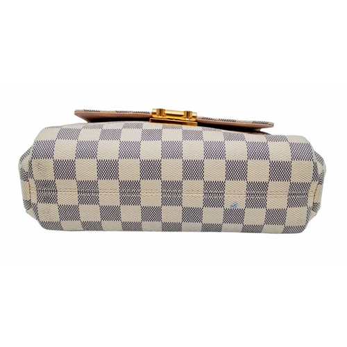 123 - A Louis Vuitton damier canvas Croisette handbag in cream/blue, interior is baby pink. Leather handle... 