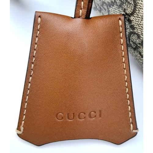 15 - A Gucci GG padlock medium shoulder bag, gold tone hardware, brown suede leather interior. Size appro... 