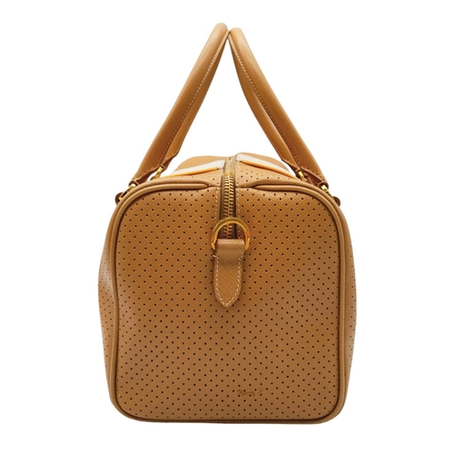 179 - A Prada beige/white perforated leather Bauletto satchel. Gold tone hardware, feet to base, no should... 