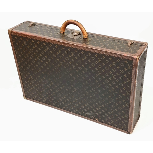 4 - A Vintage Louis Vuitton Bisten 80 Trunk. Famous Monogram Leather With Gold Tone Hardware. Size 80x52... 