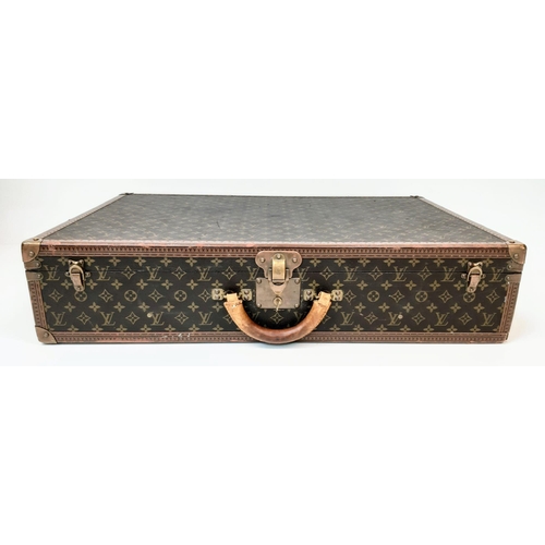 4 - A Vintage Louis Vuitton Bisten 80 Trunk. Famous Monogram Leather With Gold Tone Hardware. Size 80x52... 